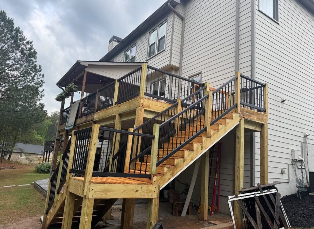Two-Level Wooden Deck with Black Railings